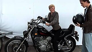 Short-Haired Biker Blonde Girl Licks Very Crooked Penis