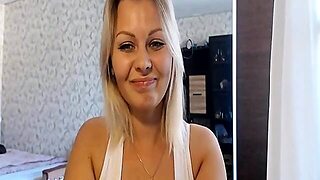 Blonde Babe Showing Kinky Smile And Breasts