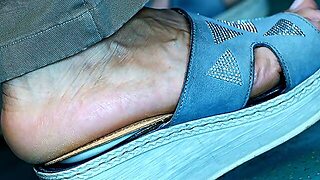 Sandals And Foot Fetish Watching Close-Up, Hot Foot Heels, The Feet Move Continuously In An Attracti