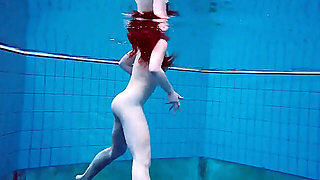 Talented Nymph In A One-Piece Swimsuit Gets Fucked Underwater