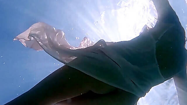 Astounding Mama With Nice Butt Katya Clover Posed Underwater In Sexy Clothes