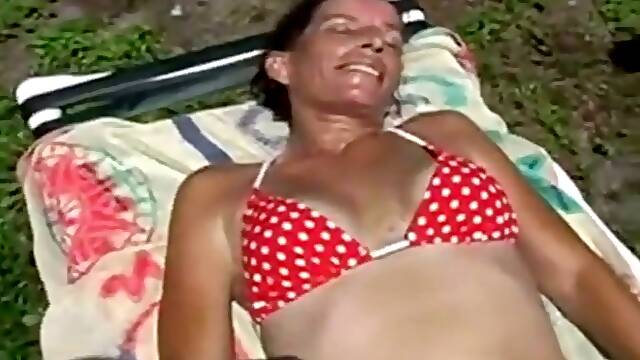 Sunbathing Wife Exposes