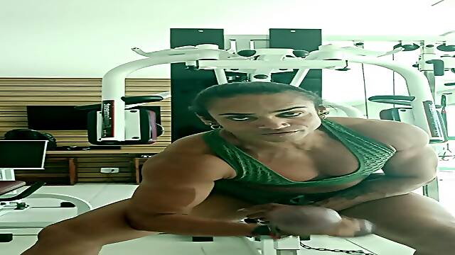 Perfect Muscled Body Builder Mom Views Her Sculpted Form