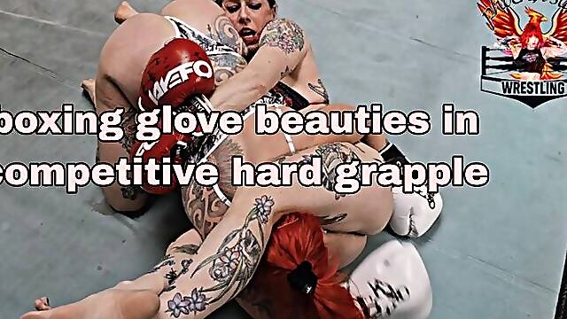 Strong Tattooed Girls Wrestle In Boxing Gloves