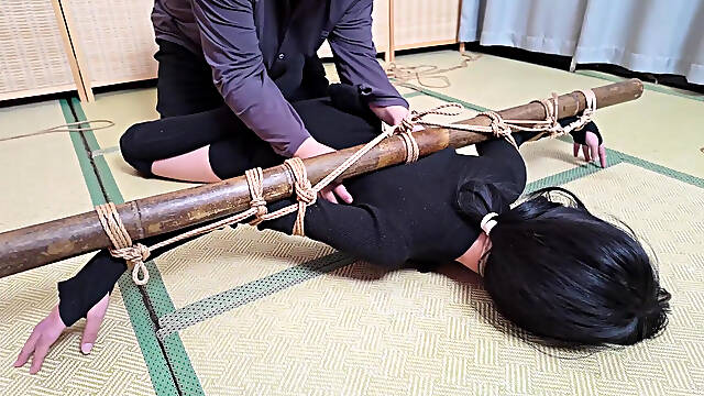 Xr40-A Girl In Black Stocking Is Tied To A Cross